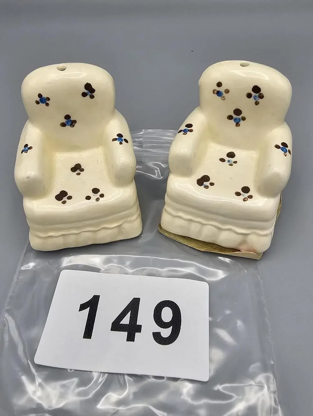 Pair of Ceramic Armchair Salt and Pepper Shakers with Floral Dot Design